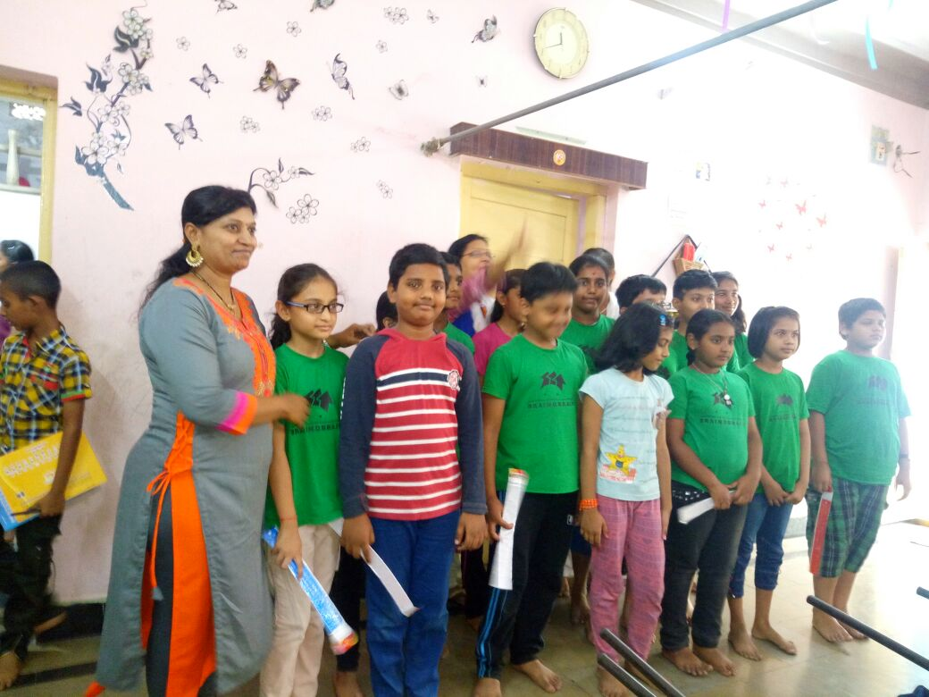Children receiving achievement certificates